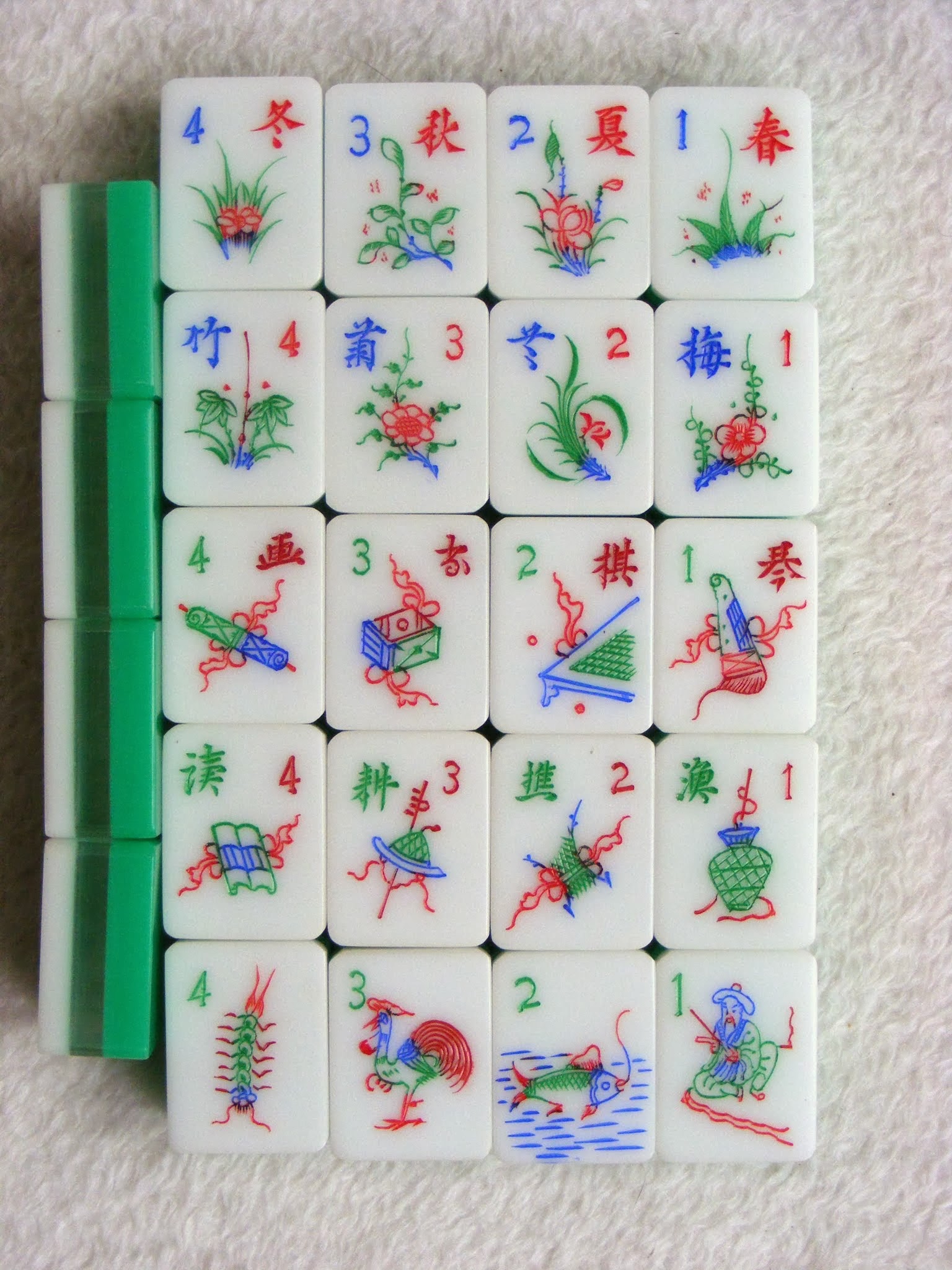 Hand Carved Tri color Mahjong Tiles: Some Flower Tile Interpretations