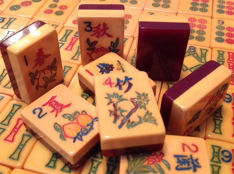 RESERVED FOR MOCLEMENS Set of 130 mahjong tiles made of French ivory  celluloid and wood, likely Parker Brothers